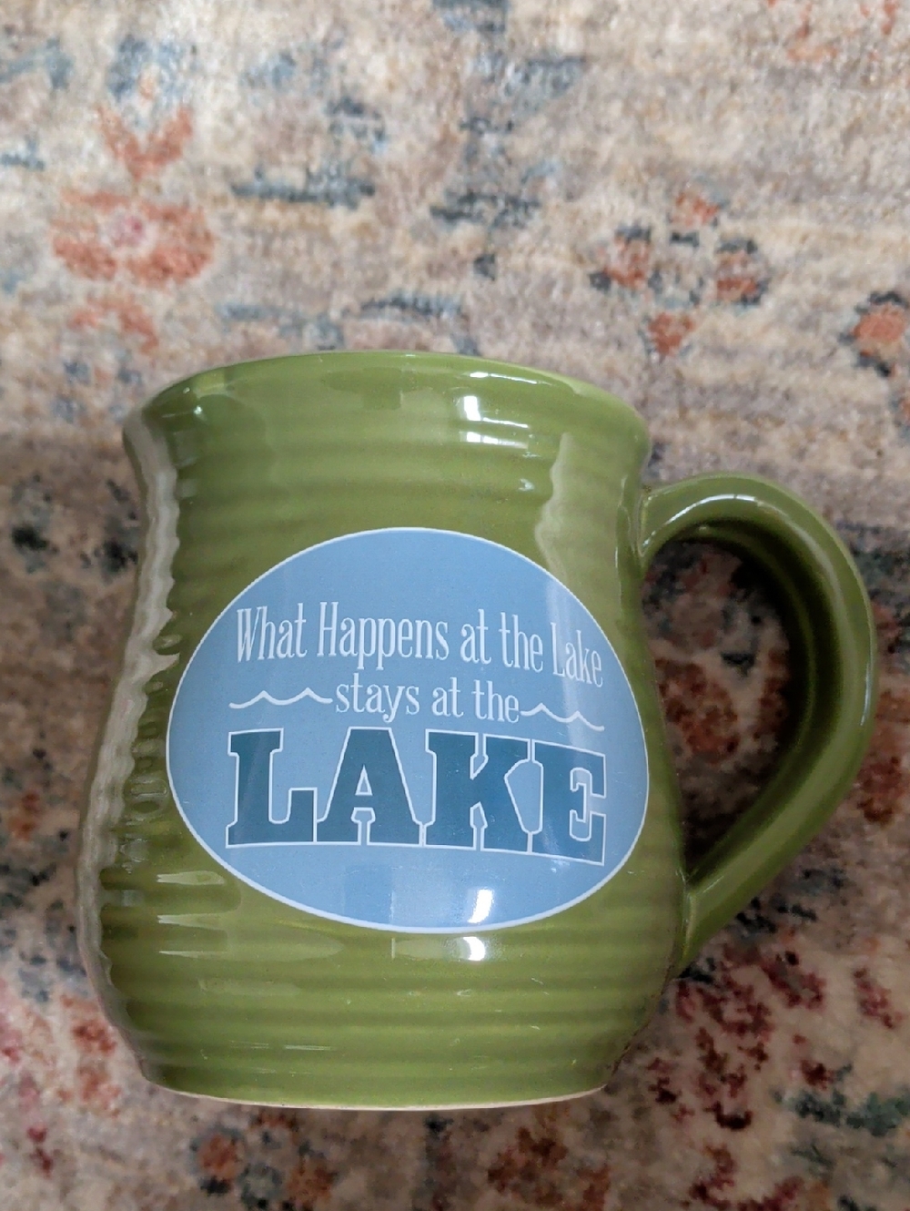What Happens at the Lake Green Ceramic Mug